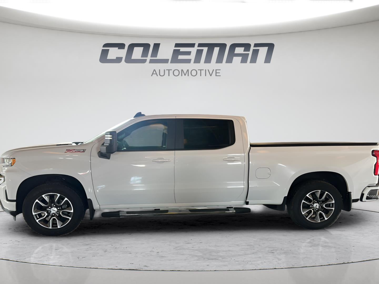 2021 Chevrolet Silverado 1500 RST in Summit White — front three-quarter view