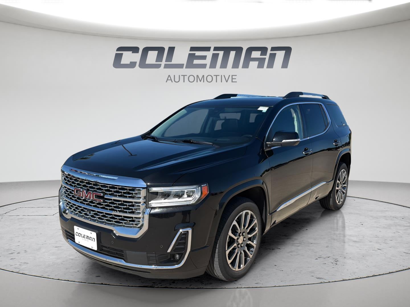 2021 GMC Acadia Denali in Ebony Twilight Metallic — front three-quarter view