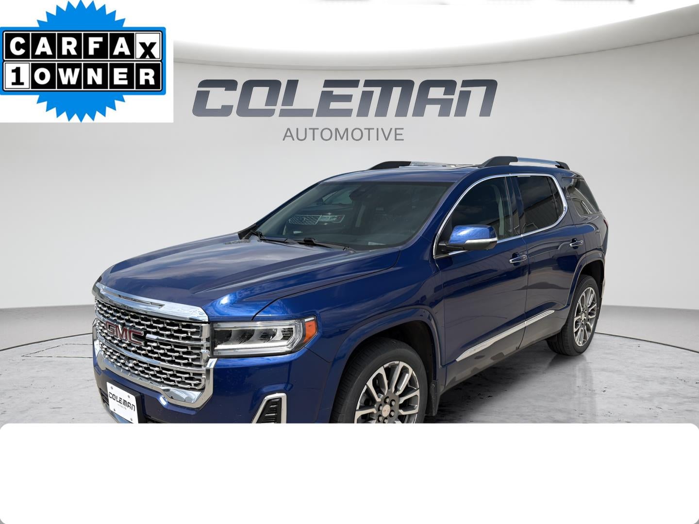 2023 GMC Acadia Denali in Ultra Blue Metallic — front three-quarter view