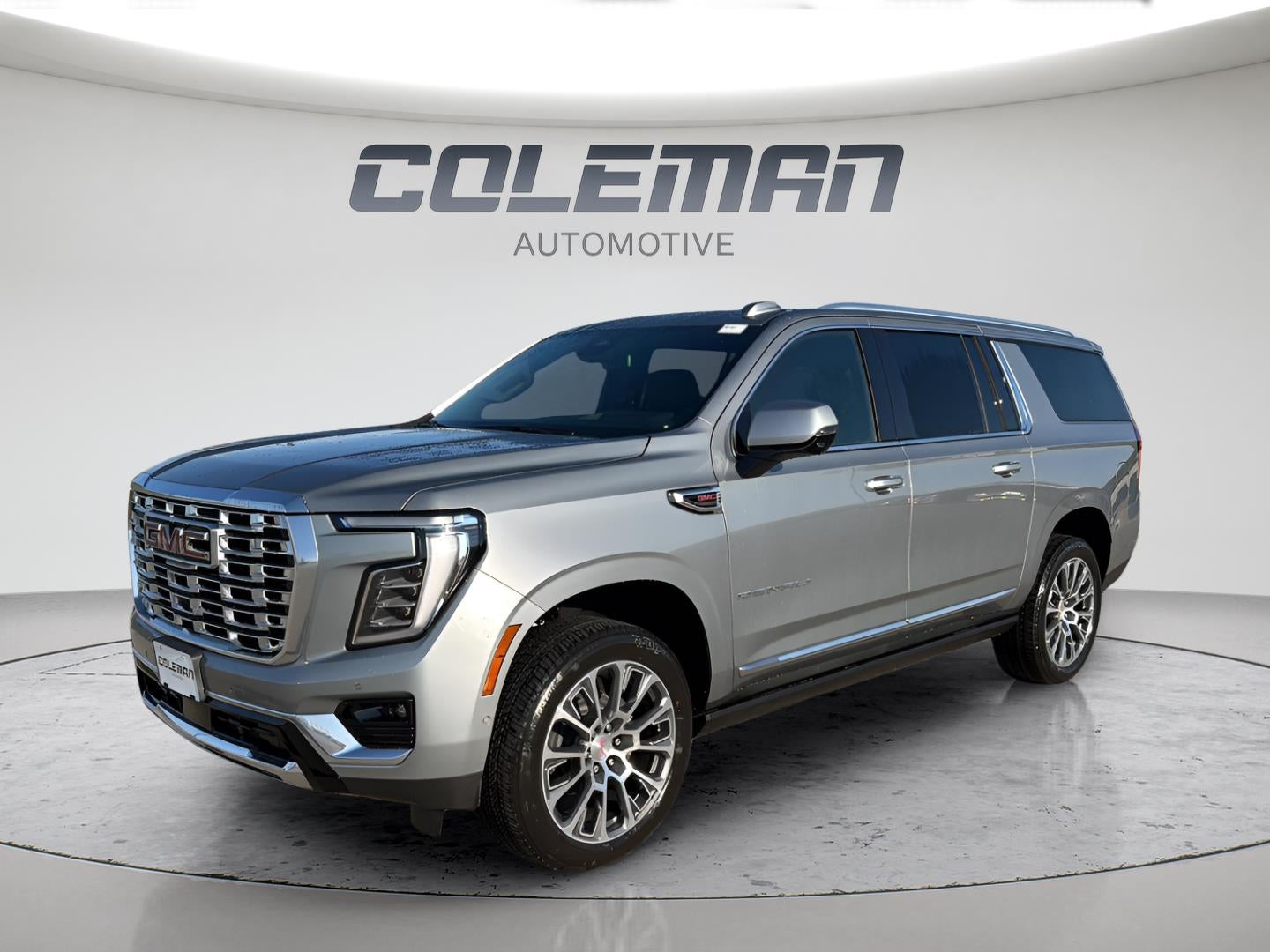 2026 GMC Yukon XL Denali in Sterling Metallic — front three-quarter view