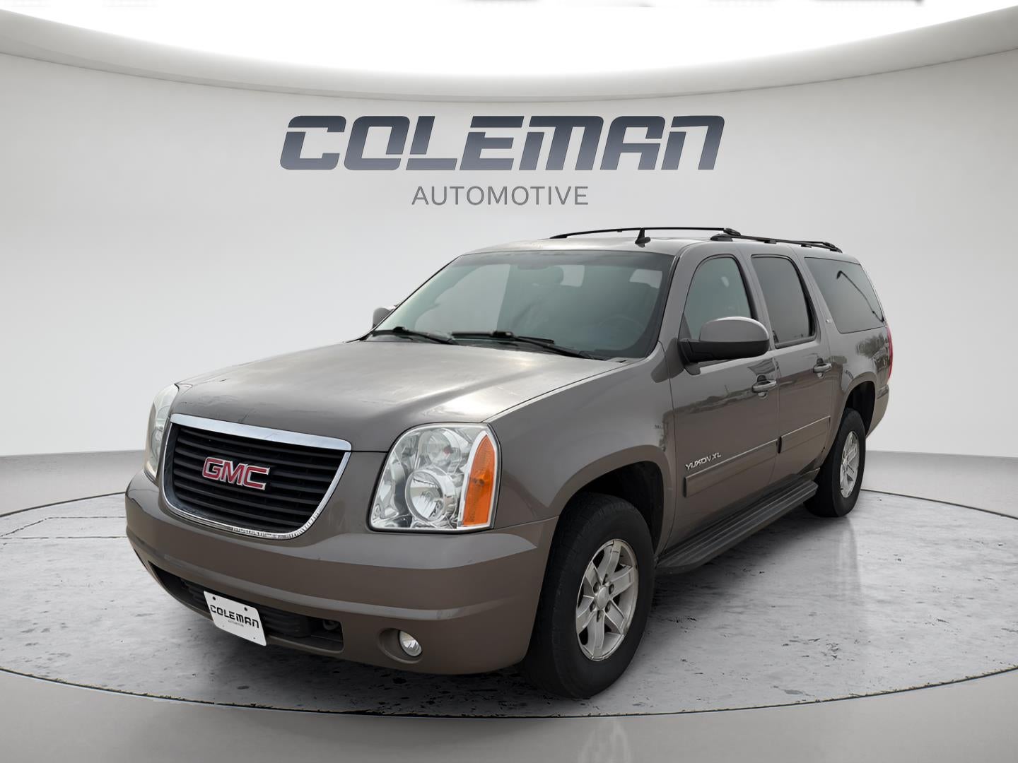 2014 GMC Yukon XL SLT in Mocha Steel Metallic — front three-quarter view