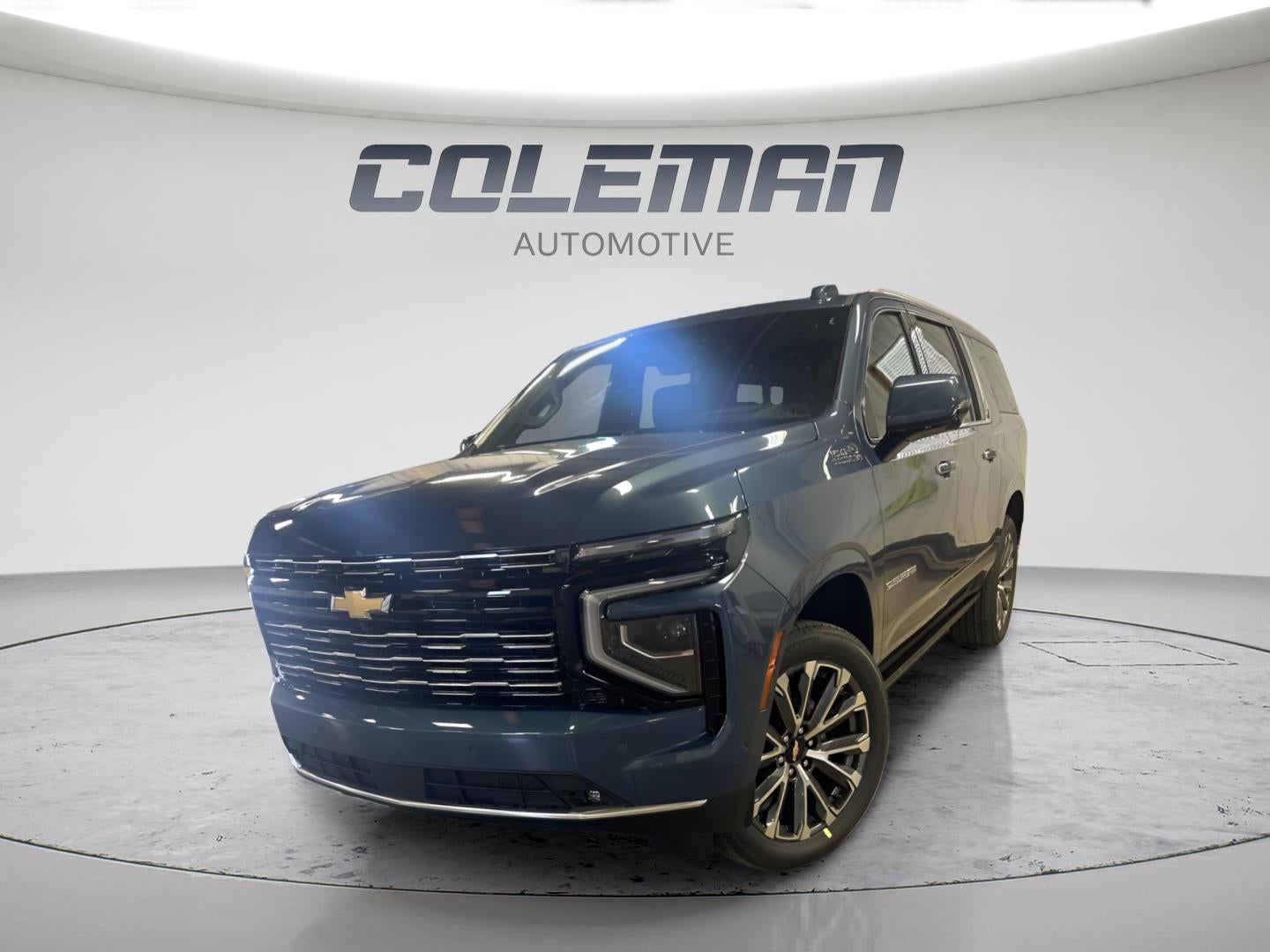 2026 Chevrolet Suburban High Country in Lakeshore Blue Metallic — front three-quarter view