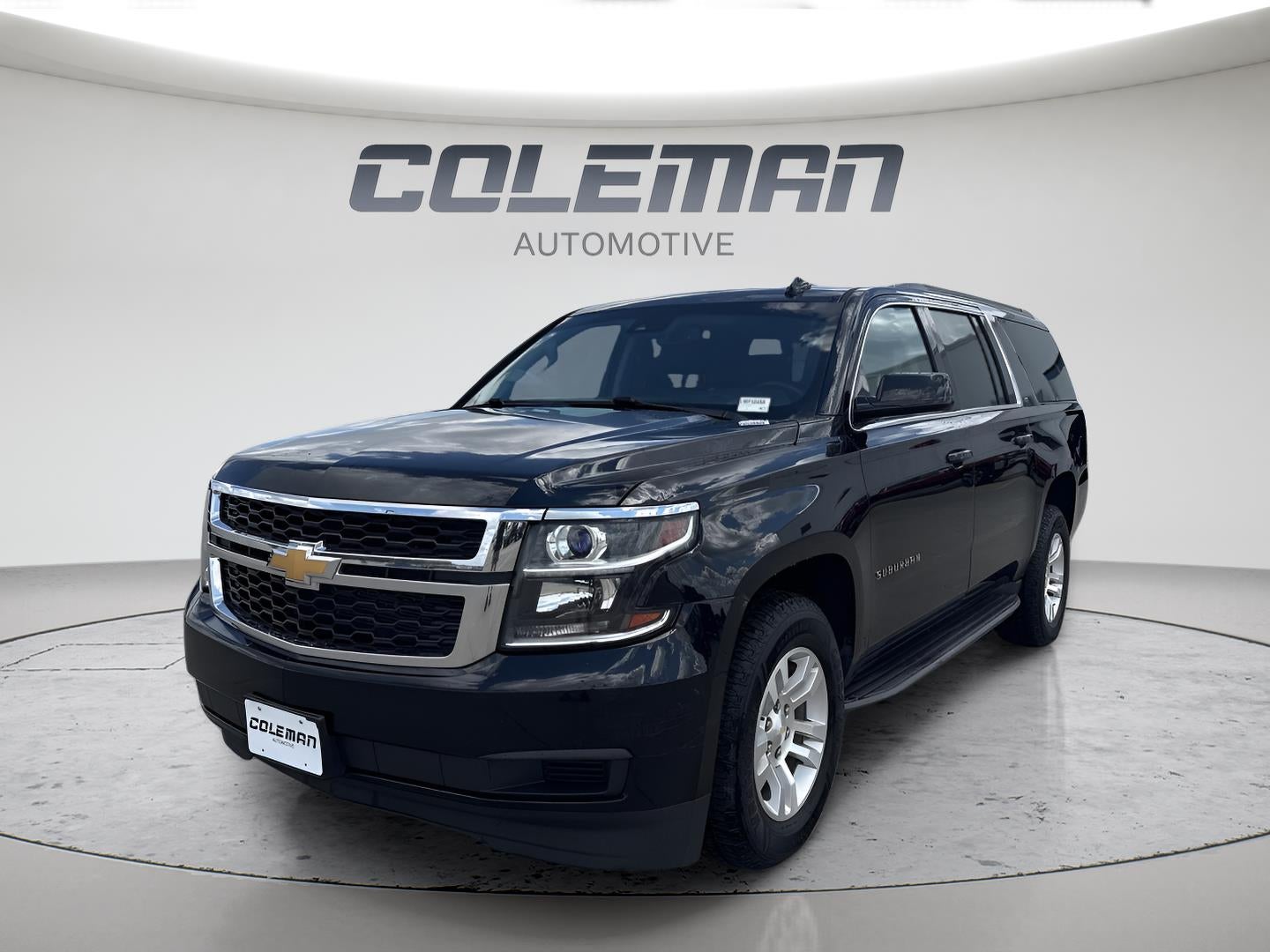 2016 Chevrolet Suburban LT in Black — front three-quarter view