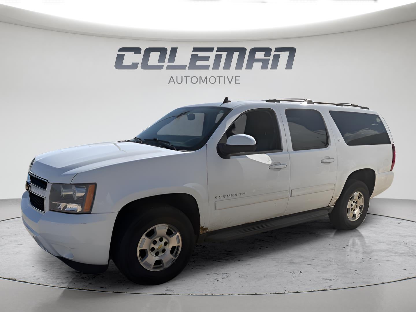 2012 Chevrolet Suburban LT in Summit White — front three-quarter view