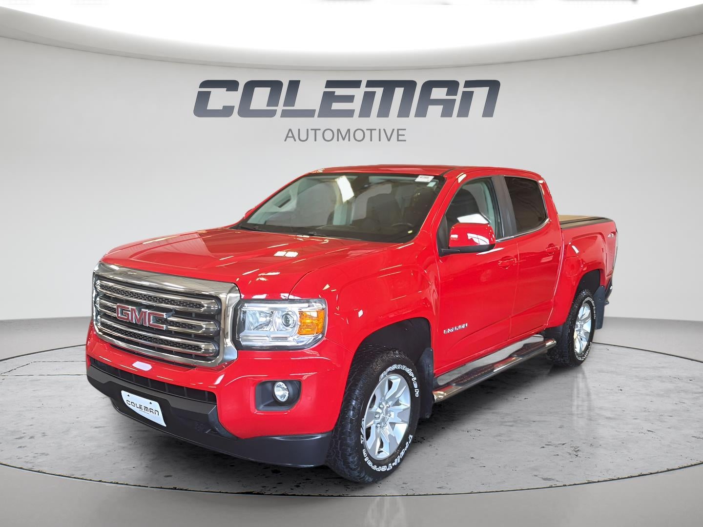 2018 GMC Canyon 4WD SLE in Cardinal Red — front three-quarter view