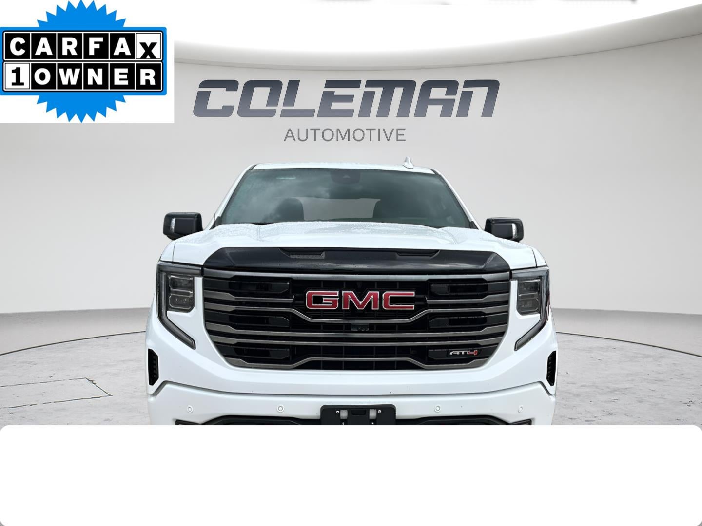 2026 GMC Sierra 1500 AT4 in Summit White — front three-quarter view