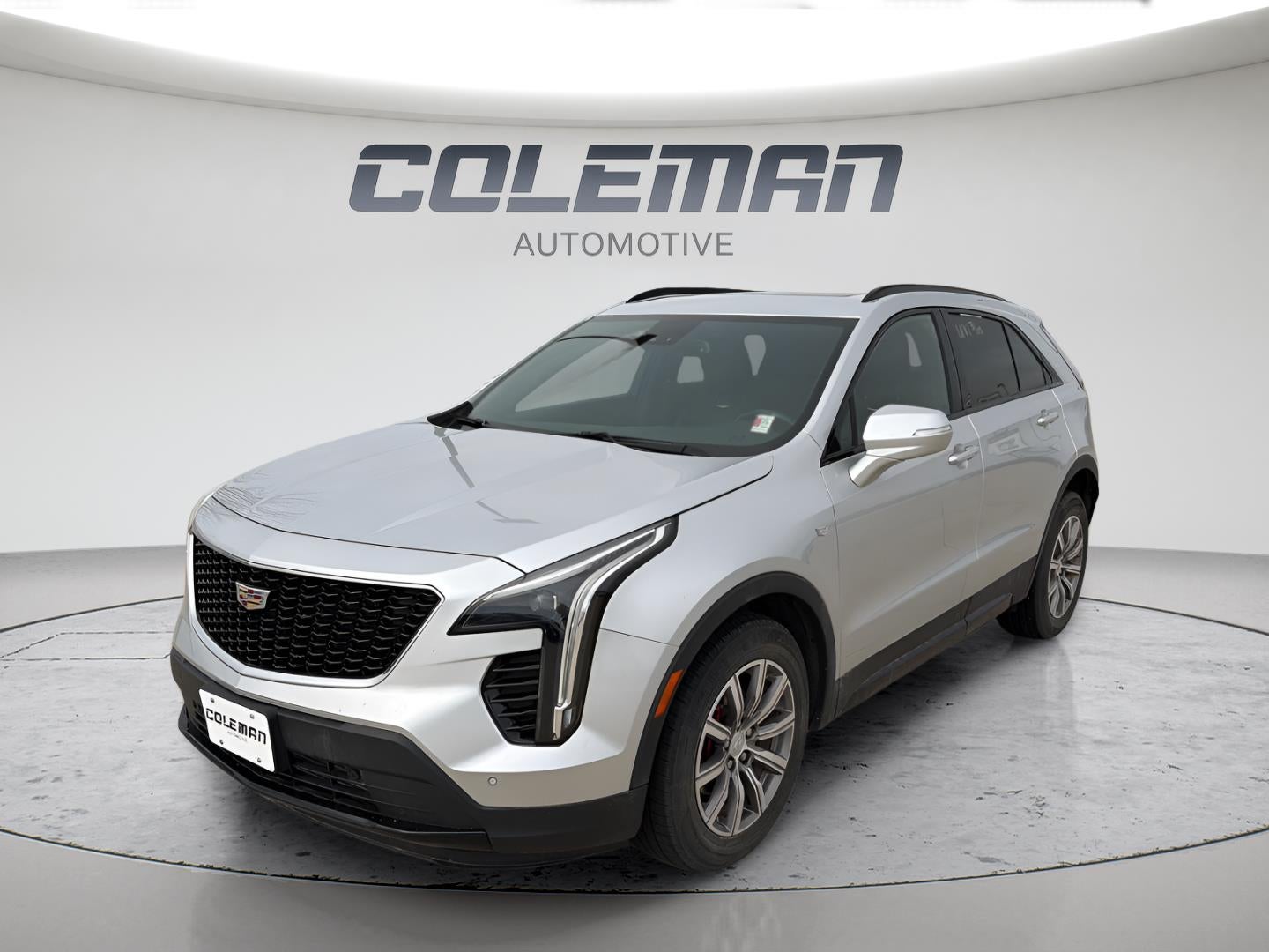 2021 Cadillac XT4 Sport in Radiant Silver Metallic — front three-quarter view