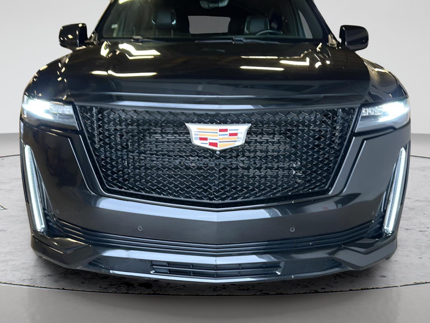 2024 Cadillac Escalade Sport in Black Raven — front three-quarter view
