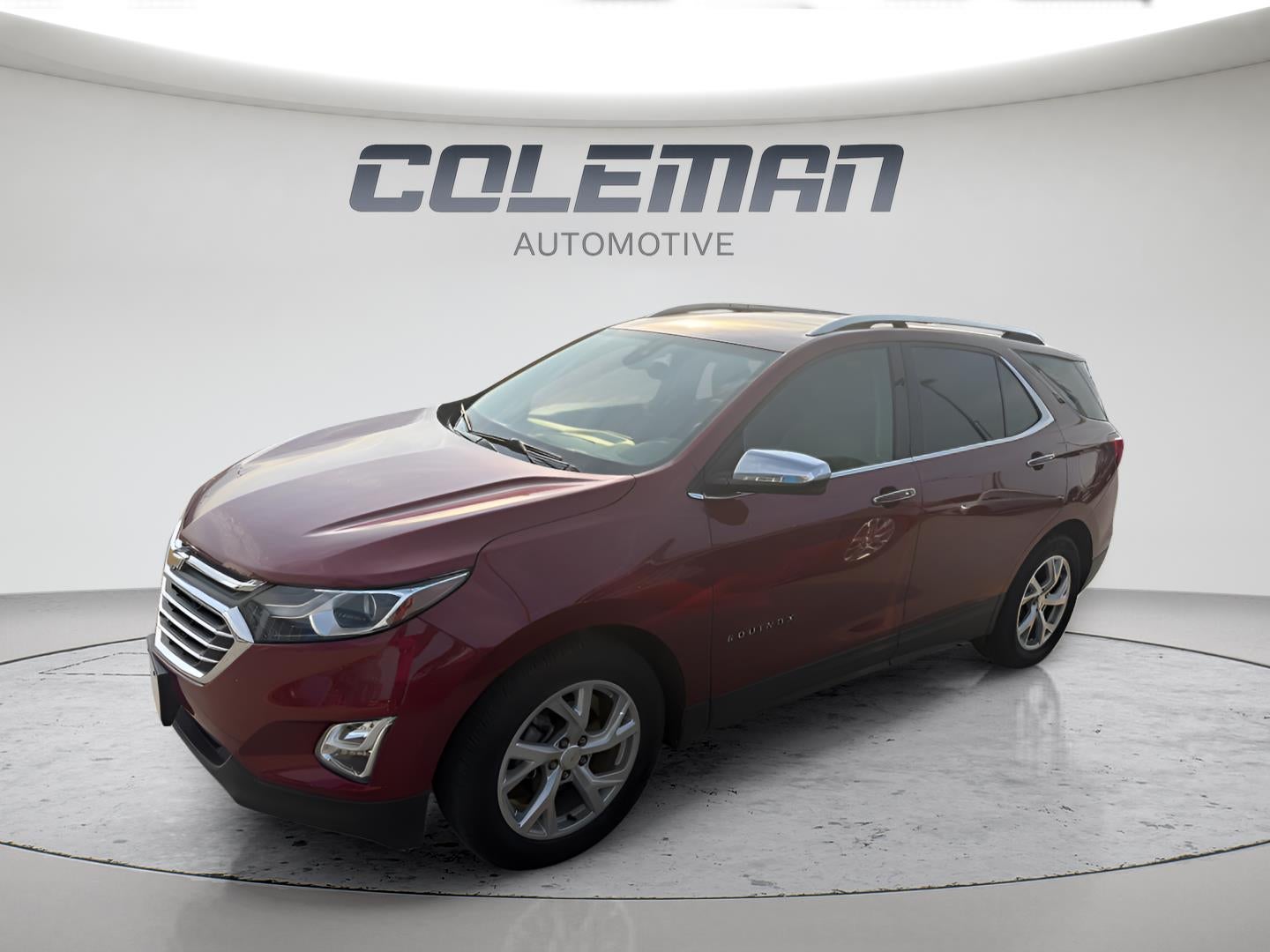 2018 Chevrolet Equinox Premier in Cajun Red Tintcoat — front three-quarter view