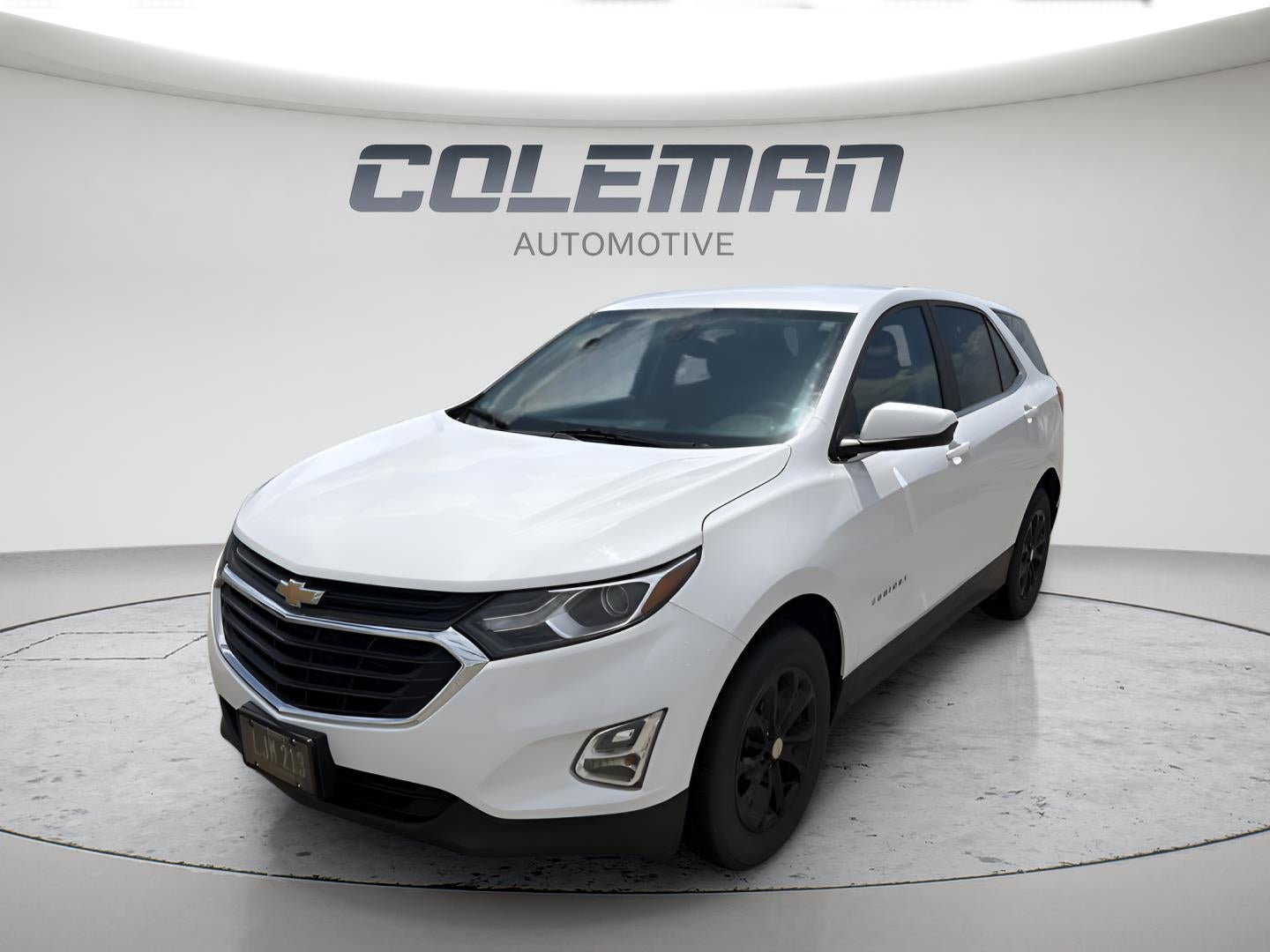 2021 Chevrolet Equinox LT in Summit White — front three-quarter view