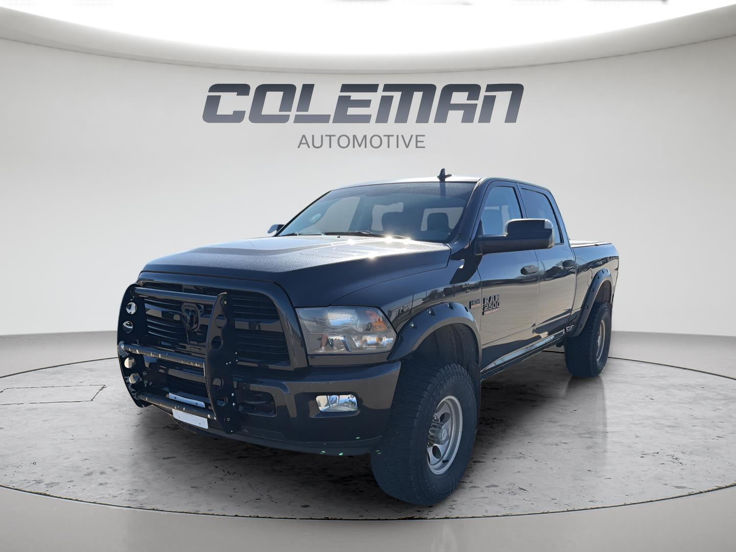 2016 RAM 2500 Big Horn in Black — front three-quarter view
