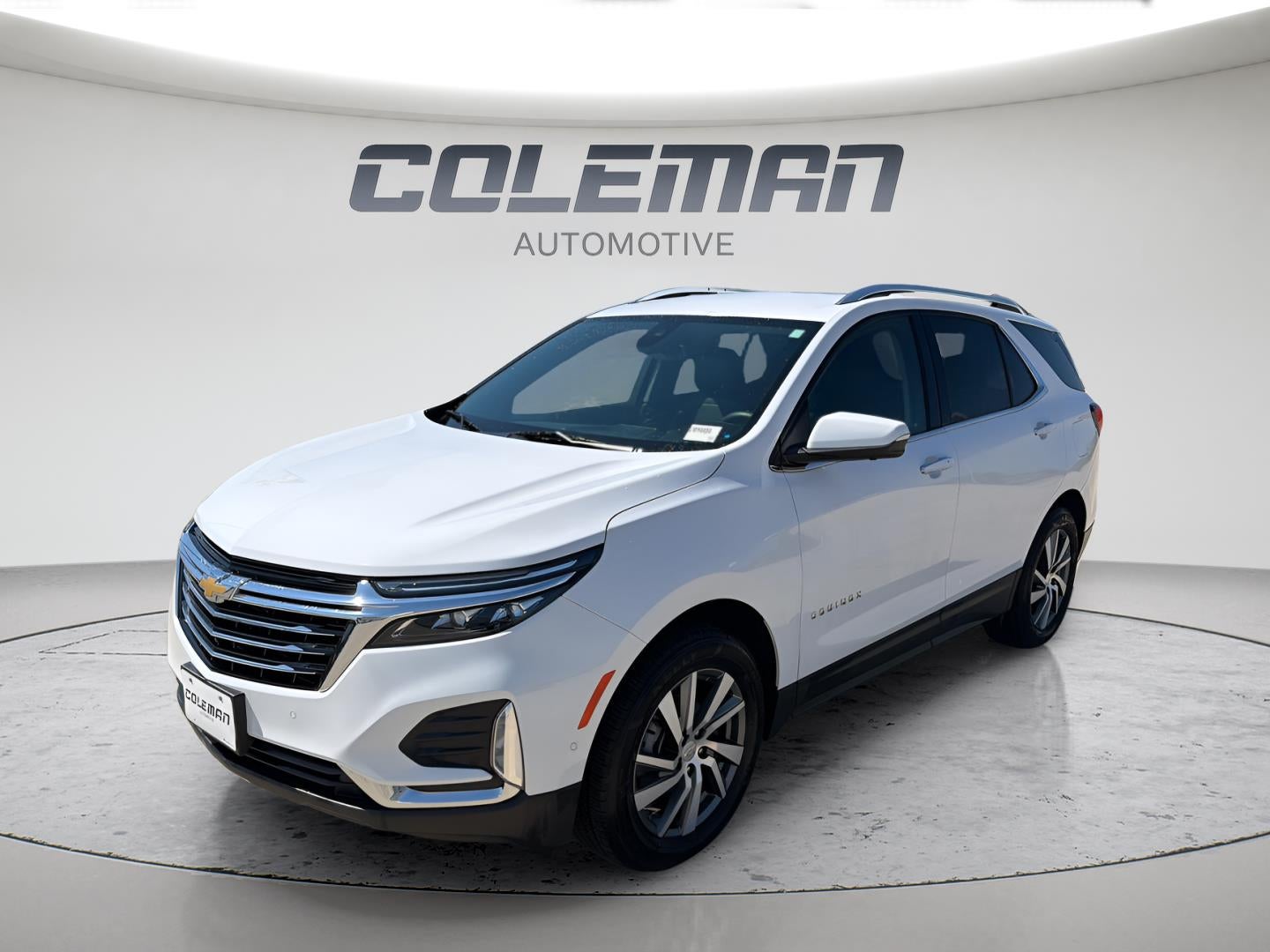 2023 Chevrolet Equinox Premier in Summit White — front three-quarter view